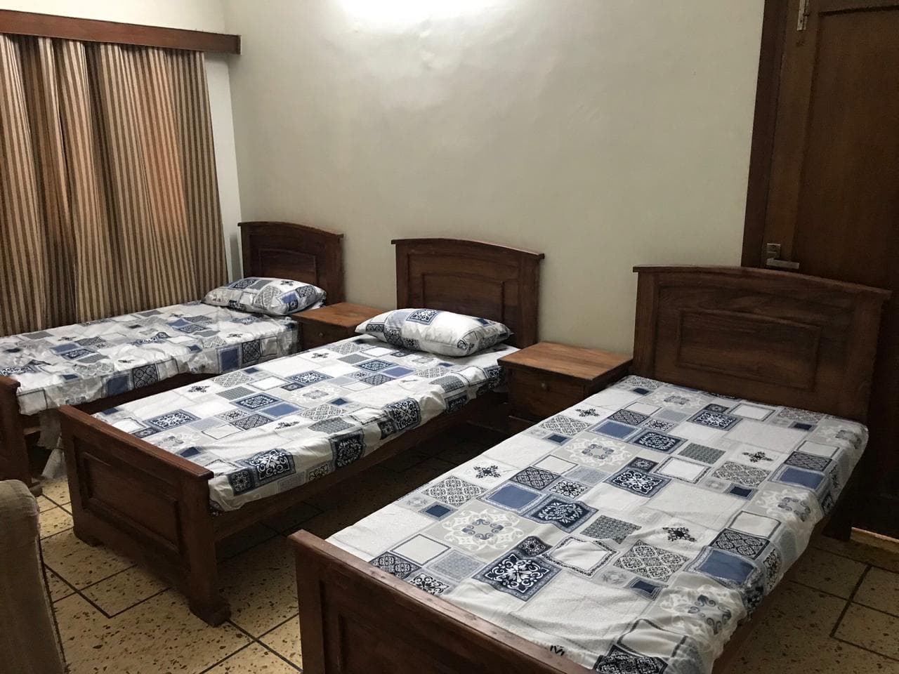 Triple sharing room at Imperial Girls Hostel